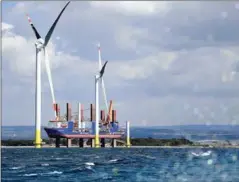  ?? AFP ?? The Mediterran­ean’s first offshore wind farm is rising from the shallows off Italy.