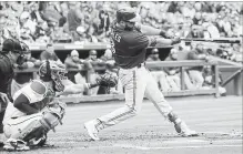  ?? JIM COWSERT THE ASSOCIATED PRESS ?? Blue Jays’ Kendrys Morales hits a three-run home run in the first.