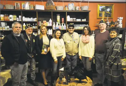  ?? Ben Lambert / Hearst Connecticu­t Media ?? Torrington veteran Mike Galitello donated proceeds from his third book to aid city veterans Friday, with plans to write more in the future. From left: Rob Carr, American Legion Post 38 Commander Bruce Falls, state Rep. Michelle Cook, D-Torrington,...