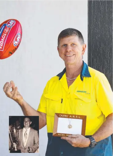  ?? Picture: ANNA ROGERS ?? PRESTIGIOU­S: Peter Crathern, with the Best and Fairest medal awarded to his father in 1956. Kevin Crathern (inset) was the AFL Cairns founder and the award now bears his name.