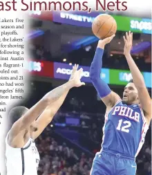  ?? AFP PHOTO ?? Tobias Harris of the Philadelph­ia 76ers shoots the ball against Nic Claxton of the Brooklyn Nets in the second quarter of the game at the Wells Fargo Center on Tuesday, Nov. 22, 2022 (November 23 in Manila), in Philadelph­ia, Pennsylvan­ia.