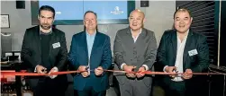  ?? ?? Sajad Bassam, of the Marsden Group, left, and Sir John Key with Michael and John Chow at the opening of their new hotel.