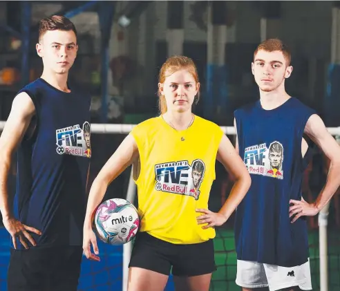  ?? Picture: BRENDAN RADKE ?? DRIVEN AMBITION: Redlynch Razorbacks Football Club’s Bryce Parker-Smith, Danielle Reed and Riley Edwards will compete in tonight’s Neymar Jr's five-a-side indoor football tournament at Cairns Indoor Sports at Manunda.