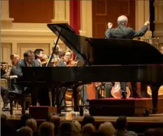  ?? Edward DeArmitt/Pittsburgh Symphony Orchestra ?? Pianist Igor Levit deliveres a rousing interpreta­tion of Mozart’s Piano Concerto No. 22 in E-flat major with the Pittsburgh Symphony Orchestra Friday at Heinz Hall.