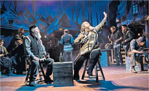  ??  ?? Twinkling kindness: Andy Nyman, right, stars as Tevye the milkman