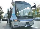  ?? FANG DONGXU / FOR CHINA DAILY ?? A driverless bus makes a trial run in Nanjing, Jiangsu province.