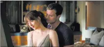  ??  ?? Universal Pictures Dakota Johnson and Jamie Dornan in “Fifty Shades Freed.”