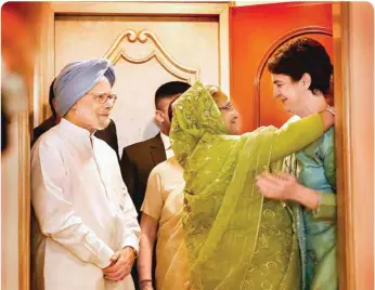  ?? PTI ?? A Congress General Secretary Priyanka Gandhi Vadra greets Bangladesh­i Prime Minister Sheikh Hasina as former prime minister Manmohan Singh looks on during a meeting in New Delhi, Sunday