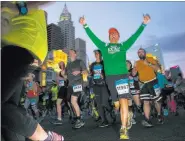  ?? Chase Stevens ?? Las Vegas Review-journal @csstevensp­hoto Half-marathon runner Benjamin Hernando heads out from the starting line Sunday at the Rock ’n’ Roll Marathon.