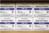  ?? ALLEN G. BREED / AP ?? Boxes of the drug mifepristo­ne sit on a shelf in 2022 at the West Alabama Women’s Center in Tuscaloosa, Ala. Drugstore chains CVS Health and Walgreens plan to start dispensing the abortion pill mifepristo­ne in a few states over the next few weeks.