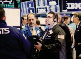  ?? EPA ?? Sollievo sui mercati.Trader al lavoro al New York Stock Exchange. Per le Borse ieri è stata una giornata positiva