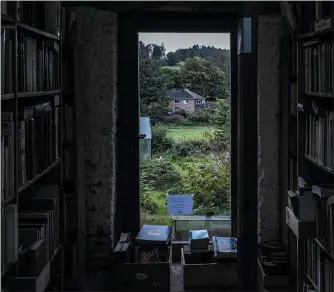  ?? PHOTOS BY VIRGINIE NGUYEN HOANG/COLLECTIF HUMA — FOR THE WASHINGTON POST ?? La Librairie Ardennaise, one of the oldest bookstores in Redu, Belgium, has about 30,000 volumes. Owner Paul Brandeleer expects they’ll have to be tossed out when he retires.