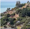  ??  ?? Hundreds of red-zoned properties owned by the Crown in the Port Hills are yet to be cleared.