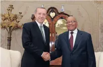  ?? Picture:REUTERS ?? NOT LIKELY TO SUCCEED: Turkey’s Prime Minister Tayyip Erdogan, left, greets President Jacob Zuma during a 2011 visit in Pretoria. Erdogan has an agenda, the writer says.