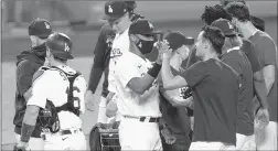  ?? ASHLEY LANDIS/AP ?? The Dodgers celebrate Tuesday night after clinching their eighth straight NL West title.