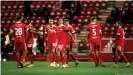  ??  ?? Flying high: Max Kruse (center) celebrates after scoring against Eintracht Frankfurt