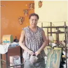  ??  ?? HOUSE PROUD: Felina, 50, an indigenous Zapotec transgende­r woman, at her quake-damaged home in Juchitan.