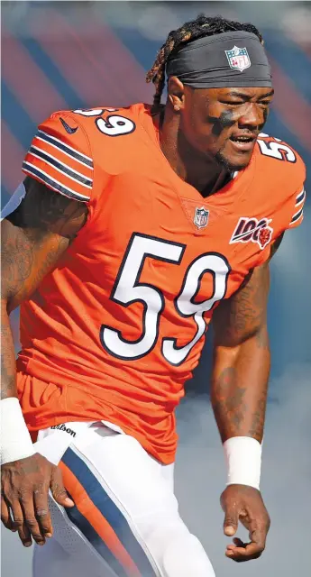  ?? JEFF HAYNES/AP ?? Inside linebacker Danny Trevathan signed a three-year, $21.75 million contract in March to stay with the Bears. Its structure all but guarantees he will be with them through at least 2021.