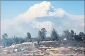  ?? COURTESY OF RICK SILVA PARADISE POST ?? The Dixie Fire, seen Friday from Paradise, is now at more than 140,000 acres.