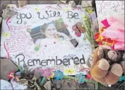  ?? Ted S. Warren Associated Press ?? A POSTER with a photo of 6-year-old victim Veronica Moser-Sullivan was shown at a memorial in 2012.
