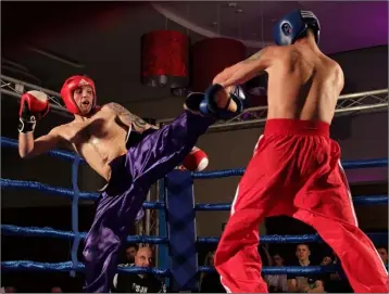  ??  ?? Wexford’s Wayne Hendrick fighting Shannon’s Bohdan Stek on his way to winning the WTKA Irish Middleweig­ht kickboxing title at the ‘Bad Intentions 2’ tournament in Clayton Whites.