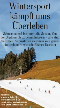  ?? DPA ?? Kein Naturschne­e in Sicht: So fahren Skifahrer in Österreich über eine präpariert­e Piste voller Kunstschne­e.