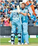  ??  ?? Going deep: Bairstow hits a six, right, and is congratula­ted on his century