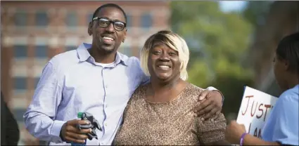  ?? TAMMY LJUNGBLAD /THE KANSAS CITY STAR VIA AP ?? In this 2017 file photo, Lamonte McIntyre (left) who was imprisoned for 23 years for a 1994 double murder in Kansas that he always said he didn’t commit, walks out of a courthouse in Kansas City, Kan., with his mother, Rosie McIntyre, after Wyandotte County District Attorney Mark A. Dupree, Sr. dropped the charges.