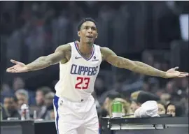  ?? Michael Owen Baker Associated Press ?? LOU WILLIAMS has the distinctio­n of being on both ends of the Clippers-Lakers rivalry. He said he’s been needled by all local fans, at least on social media.