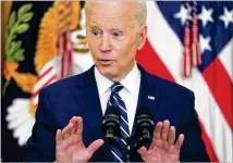  ?? EVAN VUCCI/ASSOCIATED PRESS ?? President Joe Biden addresses his first news conference Thursday in the White House in Washington. In opening remarks, he doubled his original goal on COVID-19 vaccines.