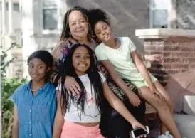  ?? PAT NABONG/SUN-TIMES PHOTOS ?? LEFT: Elizabeth Wilson, pictured with her nieces, says, “Englewood has been neglected a long time. If people don’t have anything to do, you want to do wrong in order to provide for yourself.’’