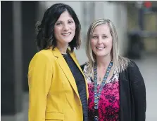  ?? DAN JANISSE ?? Laura Zuech, left, and Amy Bensette, teachers with the Windsor-Essex Catholic District School Board, are part of a new team that helps students make the transition from middle to high school.