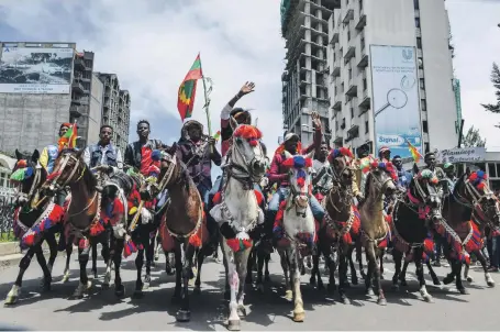  ?? AFP ?? Ethiopia’s Oromo people celebrate the return of the once-banned Oromo Liberation Front in ongoing political reforms