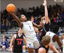  ?? O-N-E PHOTOS BY MICHELLE THOMPSON ?? Maiden seniors Jalen Robinson (above, 21) and Chris Culliver (below, 2) were the leading scorers in the home playoff loss against East Sury on Tuesday.