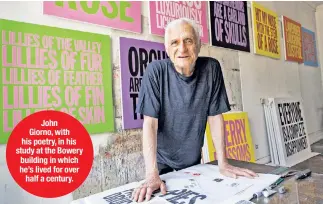  ??  ?? John Giorno, with his poetry, in his study at the Bowery building in which he’s lived for over half a century.