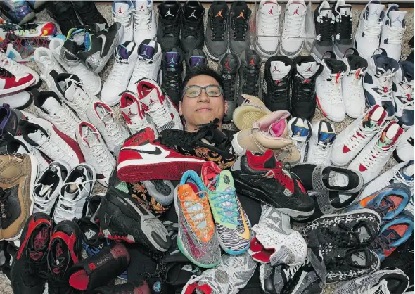  ?? LARRY WONG/EDMONTON JOURNAL ?? Robin Nanad is a self-confessed sneakerhea­d with an estimated 160 to 170 pairs in his collection. “Every shoe has a different history for it,” Nanad says.