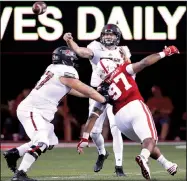  ?? AP/NATI HARNIK ?? Arkansas State quarterbac­k Justice Hansen benefited from a week off that resulted from the cancellati­on of the Red Wolves’ game against No. 17 Miami on Saturday. Hansen still has a bruised shoulder from the Sept. 2 opener at Nebraska.