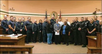  ?? CONTRIBUTE­D ?? Members of Bethel AME Church in Lebanon thank emergency personnel who responded to a fire at the church on Dec. 13, 2017. Church officials presented first responders with a resolution at Wednesday’s Lebanon City Council meeting.