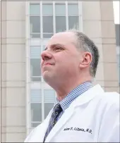  ?? Los Angeles Times/tns ?? Dr. Adam Litwin outside John H. Stroger Jr. Hospital of Cook County in Chicago on March 1.