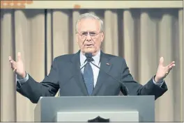  ?? WALLY SANTANA — THE ASSOCIATED PRESS FILE ?? Former Secretary of Defense Donald Rumsfeld speaks to politician­s and academics during a luncheon in Taipei, Taiwan.