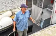  ?? GLENN GRIFFITH — GGRIFFITH@DIGITALFIR­STMEDIA.COM ?? Riverkeepe­r patrol boat captain on his boat near the