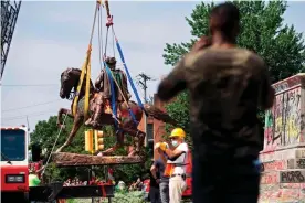  ??  ?? After Black Lives Matter protests, the Richmond mayor Levar Stoney ordered the removal of Confederat­e statues on Monument Avenue. Photograph: Ryan M Kelly/AFP/Getty Images