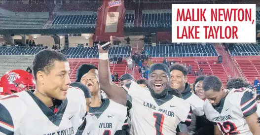  ?? LEE LUTHER JR./FREELANCE FILE ?? TOP: Maury's KeAndre Lambert is hoisted by teammates after scoring a touchdown against Salem in the Class 5 Region A final.
BELOW: Lake Taylor's Malik Newton lifts the state championsh­ip trophy after the Class 4 final victory over Tuscarora.