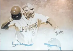  ?? Steel Brooks Las Vegas Review-journal ?? A new Las Vegas Ballpark mural showcasing the history of minor league baseball in Vegas includes this image of former 51s manager Wally Backman tossing his helmet while arguing with an umpire.