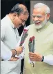  ?? PTI ?? It was Prime Minister Narendra Modi’s idea to greet guests with books or a single flower rather than a bouquet.