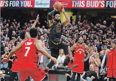  ?? GREGORY SHAMUS GETTY IMAGES ?? LeBron James made it look so easy taking the ball with eight seconds to go down the court and sinking the game winner at the buzzer.