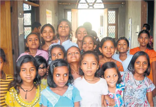  ?? DAVID MCKINSTRY ?? David McKinstry was the first Canadian gay man approved for internatio­nal adoption. These girls at an orphanage in India were hoping to find a new home.