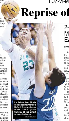  ??  ?? La Salle’s Ben Mbala shoots against Ateneo’s Rafael Verano during their UAAP game Sunday at the Smart Araneta Coliseum.