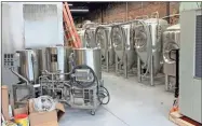  ?? Daniel Bell ?? Freight and Rail Brewing Co. brought in $190,000 worth of brewing equipment to Downtown Calhoun.