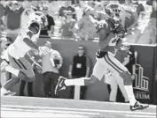  ?? Allen J. Schaben Los Angeles Times ?? TYLER VAUGHNS makes it look easy with a 37yard catch for USC’s first touchdown of the game.